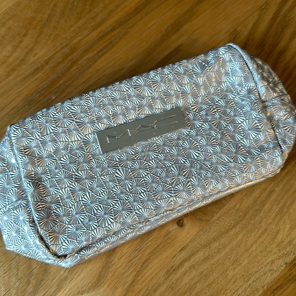 MAC Cosmetics Handbags - Never used! MAC silver makeup bag! Beautiful!